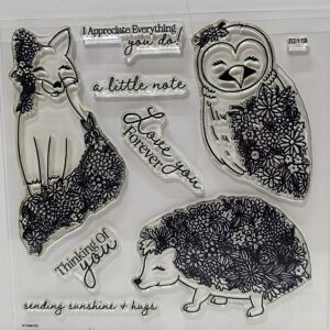 clear acrylic stamp with a fox, owl and hedgehog